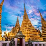 The Chedis of Bangkok's Wat Pho at twilght