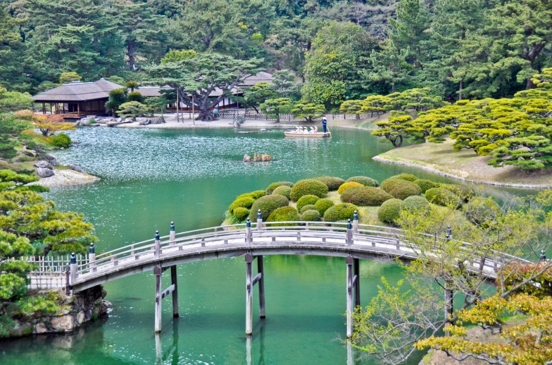 Boaters enjoy a visit to the famous Japanese Garden Ritsurin Koen, in Takamatsu, Japan