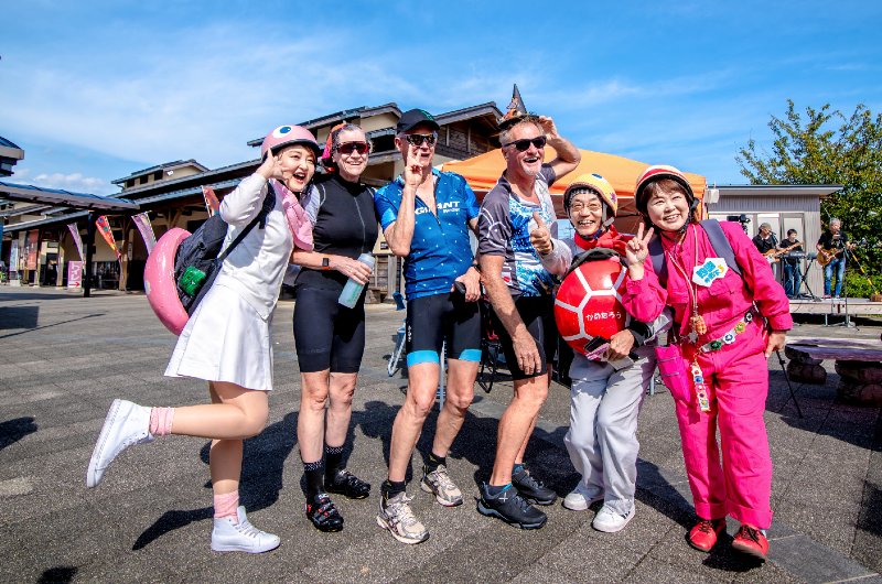 Cyclists pause for a moment of laughter with the heartwarming community in rural Japan on a cycling tour of Japan.
